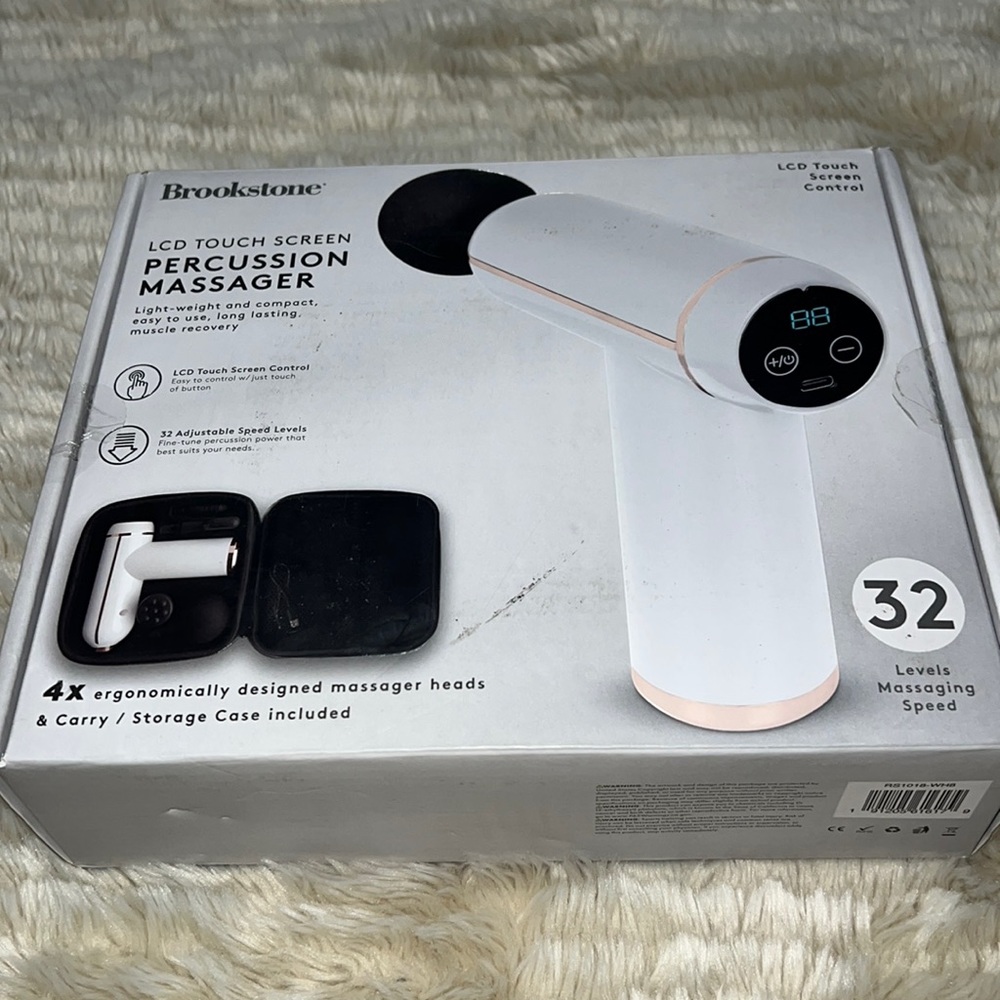 Portable touchscreen massager by BROOKSTONE